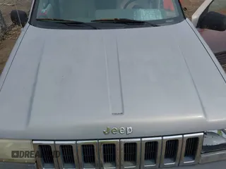 1995 Jeep Grand Cherokee Laredo with VIN 1J4GZ58S4SC532578, listed as a IAAI auction lot 41936041 with 161,777 mi miles. Bid and sale history available at carsss.com. Image 10.