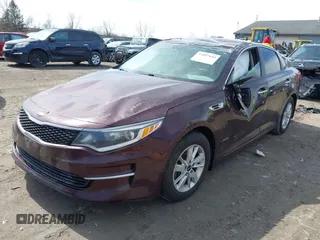 2018 Kia Optima LX with VIN 5XXGT4L33JG207050, listed as a IAAI auction lot 41857645 with 143,707 mi miles and . Bid and sale history available at DreamBid. Image 2.