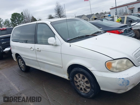 2004 Kia Sedona LX with VIN KNDUP131446537660, listed as a IAAI auction lot 41526183 with 282,891 mi miles. Bid and sale history available at carsss.com. Image 13.