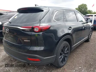 2023 Mazda CX-9 Touring Plus with VIN JM3TCBAY2P0657825, listed as a IAAI auction lot 42756562 with 52,090 mi miles and . Bid and sale history available at DreamBid. Image 4.