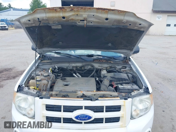 2011 Ford Escape Hybrid с VIN 1FMCU5K39BKC06037, выставлен на аукционе IAAI как лот 42610310 с пробегом 198 549 миль миль и . История ставок и продаж доступна на DreamBid. Изображение 10.