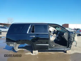2015 Cadillac Escalade Premium z VIN 1GYS3NKJ5FR655370, wystawiony jako IAAI lot #41764570 z przebiegiem Nie podano mil oraz . Historia ofert i sprzedaży dostępna na DreamBid. Obrazek 14.