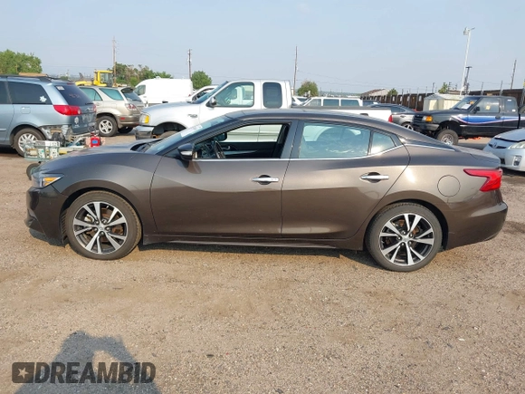 2016 Nissan Maxima SV with VIN 1N4AA6AP9GC384035, listed as a IAAI auction lot 42856838 with 116,736 mi miles and . Bid and sale history available at DreamBid. Image 14.