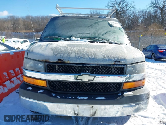 2008 Chevrolet Express Cargo Van with VIN 1GCGG25C081130147, listed as a IAAI auction lot 41585109 with 237,434 mi miles. Bid and sale history available at carsss.com. Image 6.