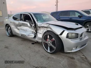 2006 Dodge Charger SRT-8 with VIN 2B3KA73W26H279925, listed as a Copart auction lot 78479574 with 127,443 mi miles and Salvage Title. Bid and sale history available at DreamBid. Image 4.