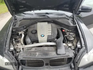 2012 BMW X5 35d with VIN 5UXZW0C54CL671377, listed as a Copart auction lot 60936395 with 105,903 mi miles and Salvage title. Bid and sale history available at DreamBid. Image 12.