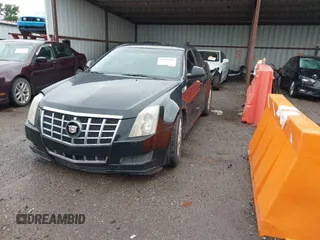 2012 Cadillac CTS with VIN 1G6DA5E58C0112066, listed as a IAAI auction lot 42128544 with 150,860 mi miles and . Bid and sale history available at DreamBid. Image 16.