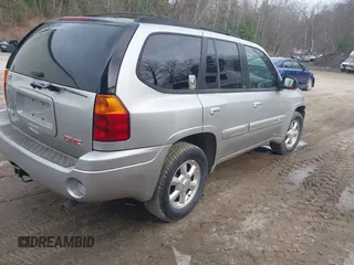 2004 GMC Envoy SLE with VIN 1GKDS13S442350938, listed as a IAAI auction lot 41790810 with 161,998 mi miles. Bid and sale history available at carsss.com. Image 4.