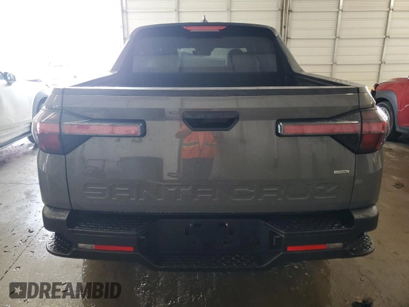 2024 Hyundai Santa Cruz SEL z VIN 5NTJBDDE8RH117547, wystawiony jako Copart lot #62145825 z przebiegiem 10 835 mil mil oraz Szkoda całkowita • Salvage title. Historia ofert i sprzedaży dostępna na DreamBid. Obrazek 6.