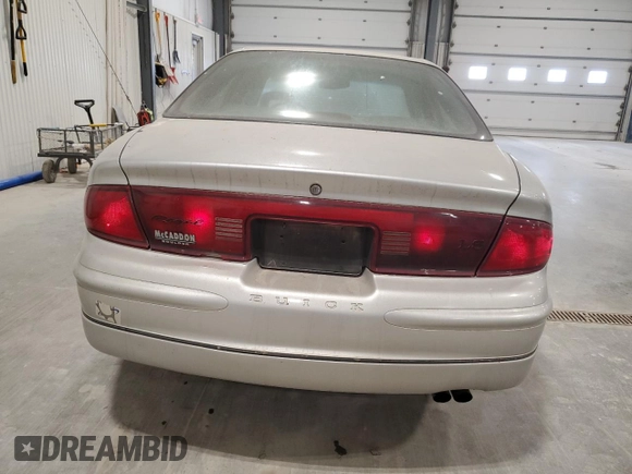 2003 Buick Regal LS с VIN 2G4WB52K031297579, выставлен на аукционе Copart как лот 57094195 с пробегом 73 310 миль миль и Чистый • Clean title. История ставок и продаж доступна на DreamBid. Изображение 6.