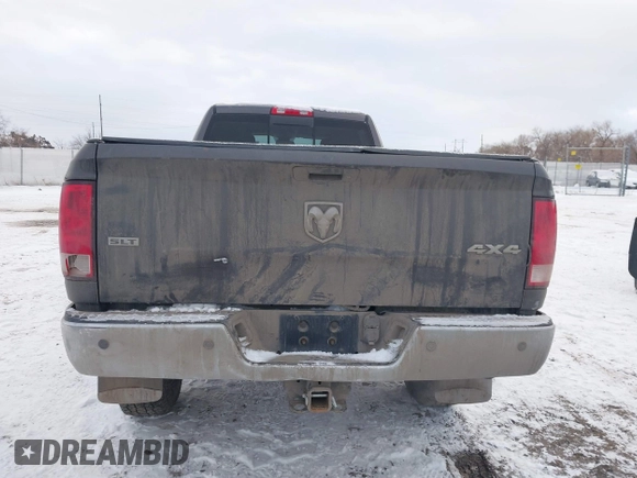 2014 Ram 2500 SLT with VIN 3C6TR5JT5EG203839, listed as a IAAI auction lot 41277795 with 135,344 mi miles and . Bid and sale history available at DreamBid. Image 16.