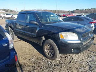2009 Mitsubishi Raider LS z VIN 1Z7HC28K89S729753, wystawiony jako IAAI lot #41696576 z przebiegiem 169 373 mil mil oraz . Historia ofert i sprzedaży dostępna na DreamBid. Obrazek 1.