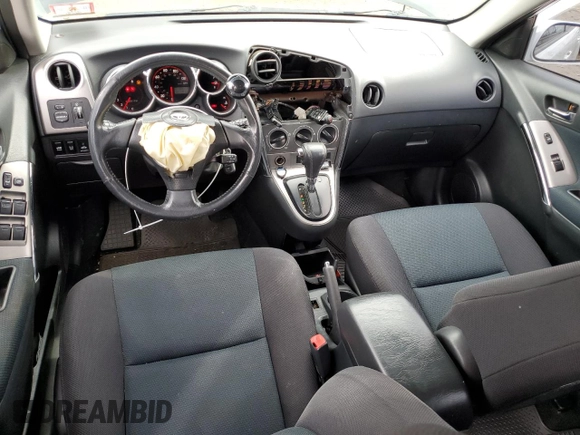 2008 Toyota Matrix STD with VIN 2T1KR32E28C700516, listed as a Copart auction lot 52072585 with 228,761 mi miles and Salvage Title. Bid and sale history available at DreamBid. Image 8.