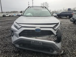 2024 Toyota RAV4 Hybrid XLE Premium with VIN 2T3B6RFV6RW066043, listed as a Copart auction lot 43470115 with 9,454 mi miles and Salvage Title. Bid and sale history available at DreamBid. Image 5.