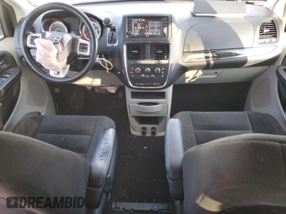 2017 Dodge Grand Caravan SE with VIN 2C4RDGBG1HR646616, listed as a Copart auction lot 87414584 with 80,318 mi miles and Salvage Title. Bid and sale history available at DreamBid. Image 8.