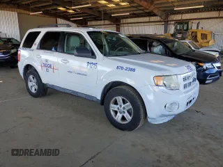 2011 Ford Escape Hybrid z VIN 1FMCU4K34BKC19594, wystawiony jako Copart lot #49479845 z przebiegiem 399 809 mil mil oraz Szkoda całkowita • Salvage title. Historia ofert i sprzedaży dostępna na DreamBid. Obrazek 4.