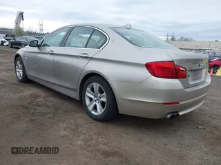 2013 BMW 5 Series 528i xDrive with VIN WBAXH5C54DD109052, listed as a IAAI auction lot 42054381 with 145,931 mi miles. Bid and sale history available at carsss.com. Image 3.