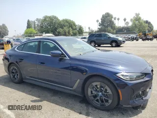 2023 BMW i4 eDrive40 with VIN WBY73AW09PFN76758, listed as a Copart auction lot 48096254 with 9,909 mi miles. Bid and sale history available at carsss.com. Image 4.