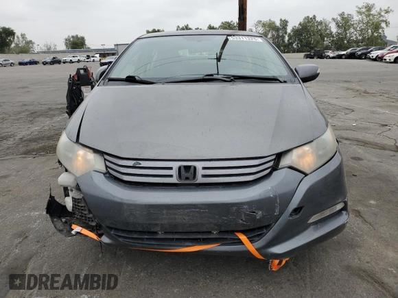 2010 Honda Insight EX with VIN JHMZE2H79AS017647, listed as a Copart auction lot 53311325 with 94,999 mi miles and Salvage Title. Bid and sale history available at DreamBid. Image 5.
