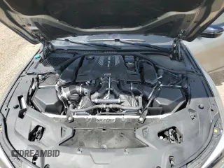 2022 BMW M8 Competition z VIN WBSGV0C08NCH61825, wystawiony jako Copart lot #57515605 z przebiegiem 56 046 mil mil oraz Tytuł czysty. Historia ofert i sprzedaży dostępna na DreamBid. Obrazek 11.