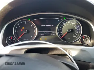 2012 Volkswagen Touareg Sport z VIN WVGFK9BP6CD002427, wystawiony jako Copart lot #42576335 z przebiegiem 167 936 mil mil oraz Szkoda całkowita • Salvage title. Historia ofert i sprzedaży dostępna na DreamBid. Obrazek 9.