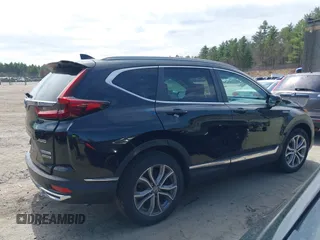 2020 Honda CR-V Touring with VIN 7FART6H96LE023782, listed as a IAAI auction lot 42053948 with 56,814 mi miles and . Bid and sale history available at DreamBid. Image 13.