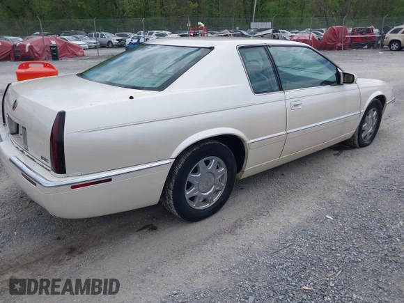 1997 Cadillac Eldorado Touring with VIN 1G6ET1293VU604921, listed as a IAAI auction lot 42113040 with 57,029 mi miles and . Bid and sale history available at DreamBid. Image 4.