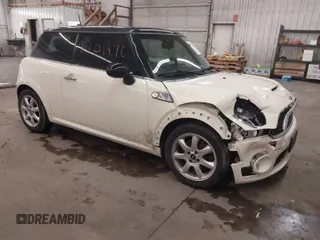 2010 MINI Hardtop S with VIN WMWMF7C50ATZ71884, listed as a IAAI auction lot 41731490 with 55,864 mi miles and . Bid and sale history available at DreamBid. Image 1.