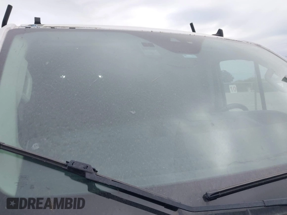 2020 Ford Transit Cargo with VIN 1FTYE1Y87LKA39598, listed as a IAAI auction lot 40989107 with 267,407 mi miles and . Bid and sale history available at DreamBid. Image 18.