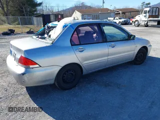 2004 Mitsubishi Lancer ES with VIN JA3AJ26E64U035168, listed as a IAAI auction lot 41625806 with 176,232 mi miles. Bid and sale history available at carsss.com. Image 4.