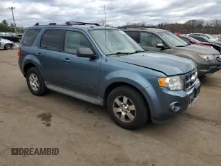 2011 Ford Escape Limited with VIN 1FMCU9EGXBKB51054, listed as a Copart auction lot 53447125 with 133,342 mi miles and Salvage Title. Bid and sale history available at DreamBid. Image 4.