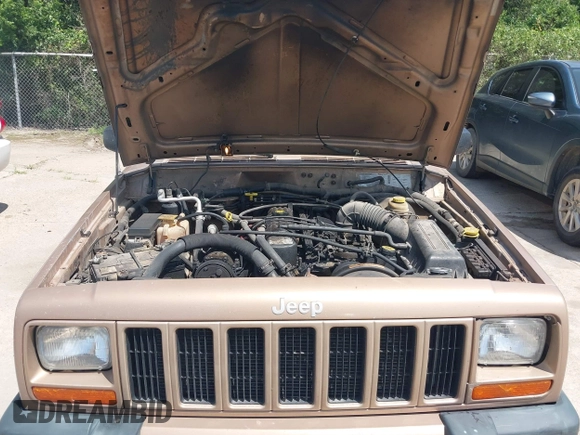 1999 Jeep Cherokee Sport with VIN 1J4FT68S1XL528885, listed as a IAAI auction lot 42536873 with Not provided miles and . Bid and sale history available at DreamBid. Image 10.