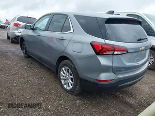 2023 Chevrolet Equinox LT with VIN 3GNAXTEG8PL245611, listed as a IAAI auction lot 42242926 with 14,387 mi miles and . Bid and sale history available at DreamBid. Image 3.