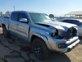 2020 Toyota Tacoma SR5 with VIN 3TMAZ5CN8LM122525, listed as a IAAI auction lot 42643334 with 74,946 mi miles and . Bid and sale history available at DreamBid. Image 1.