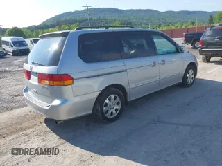 2004 Honda Odyssey EX z VIN 5FNRL18614B037143, wystawiony jako IAAI lot #42362262 z przebiegiem 203 023 mil mil oraz . Historia ofert i sprzedaży dostępna na DreamBid. Obrazek 4.