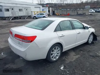 2011 Lincoln MKZ with VIN 3LNHL2GC2BR765716, listed as a IAAI auction lot 41620459 with 122,349 mi miles. Bid and sale history available at carsss.com. Image 4.