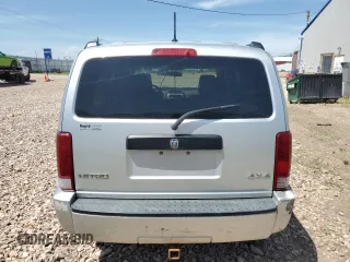 2008 Dodge Nitro SXT z VIN 1D8GU28K98W178732, wystawiony jako Copart lot #61411305 z przebiegiem 185 194 mil mil oraz Czysty tytuł • Clean title. Historia ofert i sprzedaży dostępna na DreamBid. Obrazek 6.