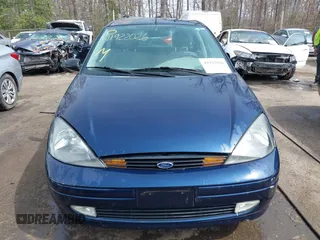 2004 Ford Focus ZX5 z VIN 3FAFP37334R120359, wystawiony jako IAAI lot #41922026 z przebiegiem 115 789 mil mil oraz . Historia ofert i sprzedaży dostępna na DreamBid. Obrazek 12.
