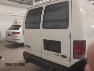 2012 Ford Econoline Cargo Recreational with VIN 1FTNE2EW4CDB03757, listed as a IAAI auction lot 42072612 with 147,153 mi miles. Bid and sale history available at carsss.com. Image 16.