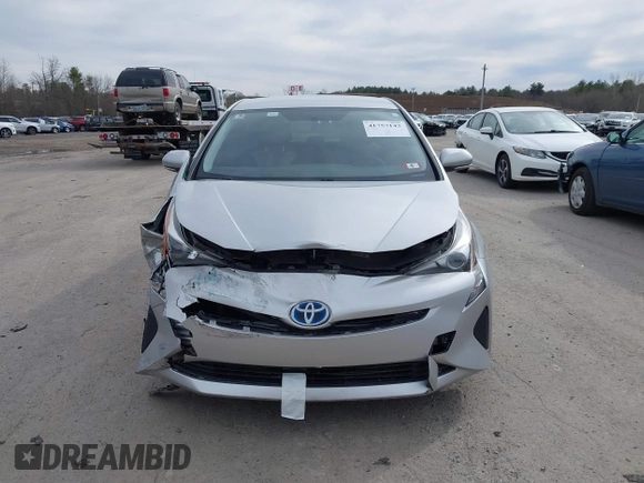 2016 Toyota Prius Two with VIN JTDKBRFUXG3023523, listed as a IAAI auction lot 41757143 with 124,144 mi miles. Bid and sale history available at carsss.com. Image 12.