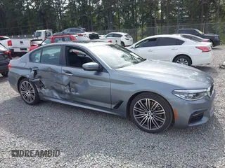 2018 BMW 5 Series 540i z VIN WBAJE5C54JG917877, wystawiony jako IAAI lot #42235433 z przebiegiem 103 375 mil mil oraz . Historia ofert i sprzedaży dostępna na DreamBid. Obrazek 13.