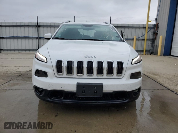 2015 Jeep Cherokee Latitude with VIN 1C4PJLCB9FW532301, listed as a Copart auction lot 52379335 with 153,845 mi miles and Salvage Title. Bid and sale history available at DreamBid. Image 5.