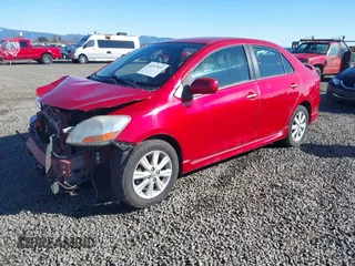 2009 Toyota Yaris z VIN JTDBT903391315199, wystawiony jako IAAI lot #41557557 z przebiegiem 188 971 mil mil oraz . Historia ofert i sprzedaży dostępna na DreamBid. Obrazek 17.