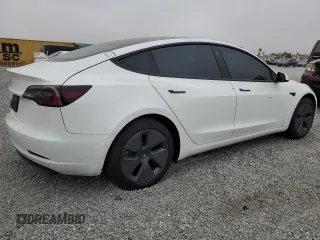 2021 Tesla Model 3 Standard Range Plus z VIN 5YJ3E1EAXMF065760, wystawiony jako Copart lot #54235345 z przebiegiem 54 413 mil mil oraz Szkoda całkowita • Salvage title. Historia ofert i sprzedaży dostępna na DreamBid. Obrazek 3.