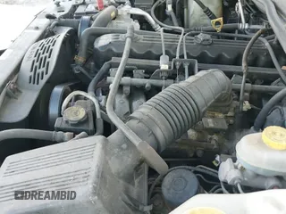 1997 Jeep Grand Cherokee Laredo z VIN 1J4GZ58S1VC603868, wystawiony jako IAAI lot #42467813 z przebiegiem 297 306 mil mil oraz . Historia ofert i sprzedaży dostępna na DreamBid. Obrazek 12.