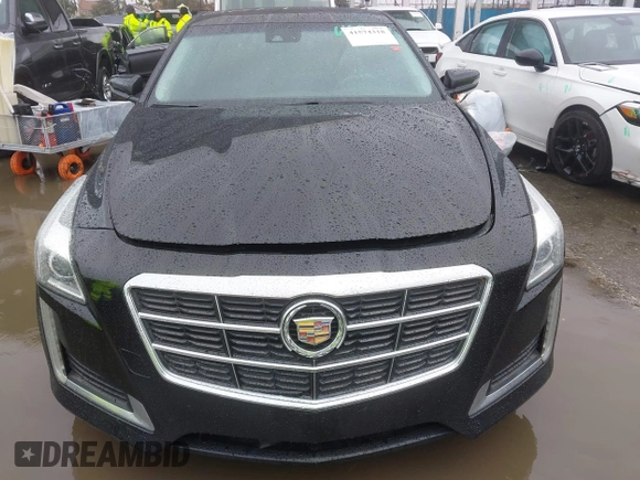 2014 Cadillac CTS Luxury AWD with VIN 1G6AX5SX3E0156938, listed as a IAAI auction lot 41574318 with 151,585 mi miles and . Bid and sale history available at DreamBid. Image 12.