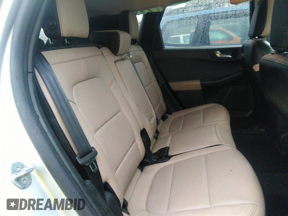 2020 Ford Escape Titanium Hybrid with VIN 1FMCU0DZ8LUB13911, listed as a IAAI auction lot 41249498 with 64,108 mi miles and . Bid and sale history available at DreamBid. Image 8.