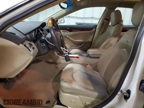 2012 Cadillac CTS Premium with VIN 1G6DS5E35C0120346, listed as a Copart auction lot 43354535 with 121,196 mi miles and Salvage Title. Bid and sale history available at DreamBid. Image 7.