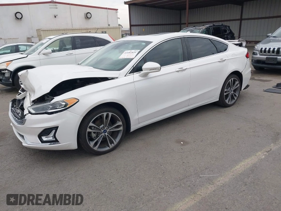 2020 Ford Fusion Titanium with VIN 3FA6P0K92LR103416, listed as a IAAI auction lot 41681810 with 54,902 mi miles and . Bid and sale history available at DreamBid. Image 2.