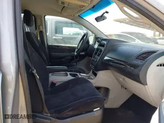 2014 Dodge Grand Caravan SXT with VIN 2C4RDGCG2ER262466, listed as a IAAI auction lot 41928445 with 218,380 mi miles. Bid and sale history available at carsss.com. Image 5.